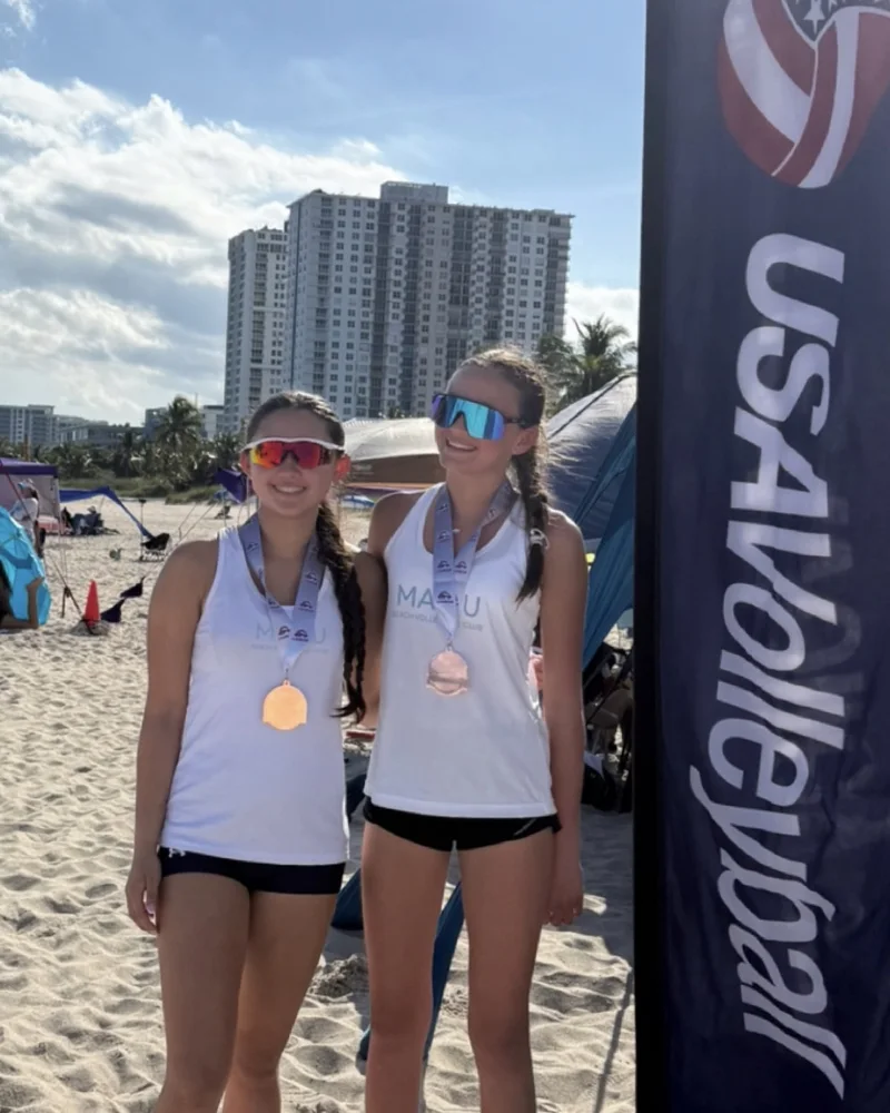 Hannah McGrath and Jordan Kurenuma with their USA Volleyball Beach National Qualifier medals